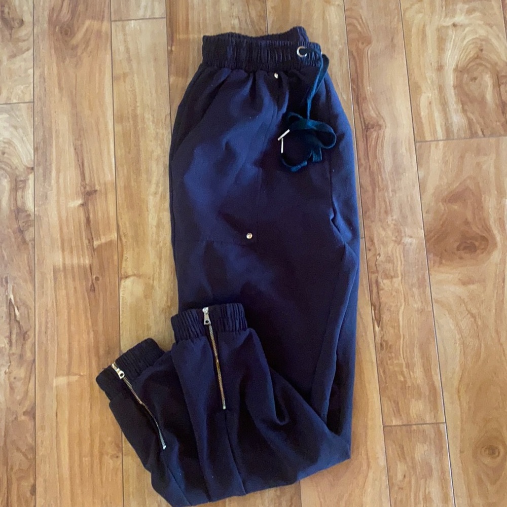 High waisted black joggers with gold detailing